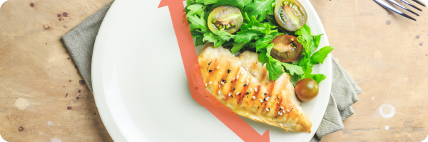 Healthy food including fish, tomatoes and lettuce on a plate with a graphic of clock hands indicating four o'clock to illustrate intermittent fasting which may be good for your gut health.