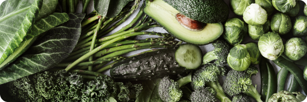An array of green fruit and vegetables.